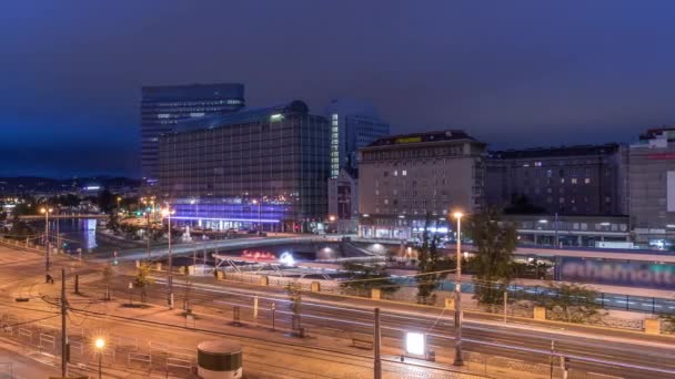 The Schwedenplatz is a square in central Vienna, located at the Danube Canal aerial night to day timelapse — Stock Video