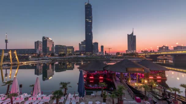 Donaustadt Danube City night to day timelapse is a modern quarter with skyscrapers and business centres in Vienna, Austria. — Stock Video