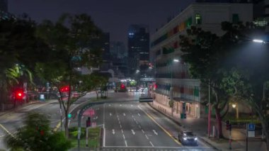 Singapur 'daki eski Hill Caddesi Polis Merkezi tarihi binası gece gündüz.
