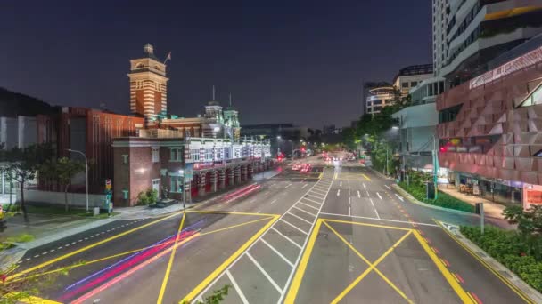 Traffico stradale vicino alla stazione dei pompieri di Singapore notte per giorno timelapse aerea . — Video Stock