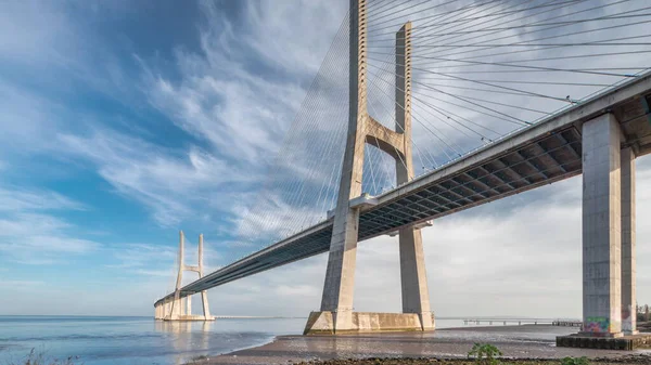 Vasco Gama Bridge Timelapse Hyperlapse Reflection Water Blue Cloudy Sky — Stock Photo, Image