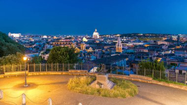 Panoramic cityscape view from the Pincio Landmark day to night transition aerial timelapse in Rome, Italy on a beautiful warm spring evening