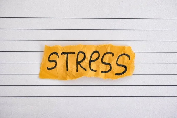 Piece Yellow Paper Word Stress Close — Stock Photo, Image