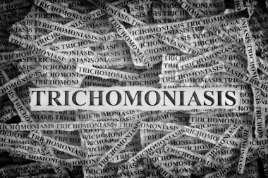 Trichomoniasis. Kağıt Trichomoniasis kelimelerle yırtık parçaları. Kavram görüntü. Siyah ve beyaz. Yakın çekim.