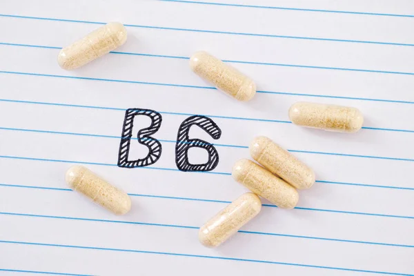 Vitamin B6 on notebook sheet — Stock Photo, Image