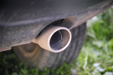 Exhaust pipe of a car. Shallow depth of field Close up.