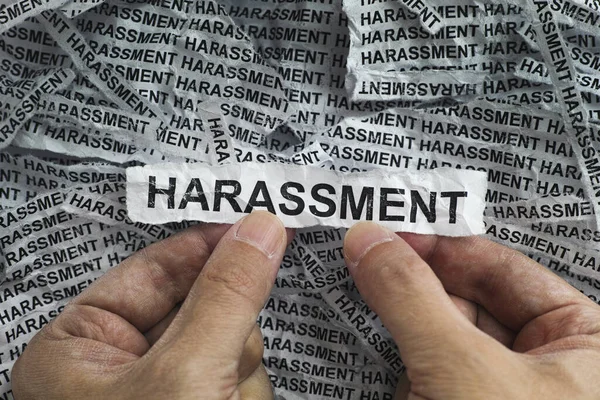Harassment Man Holding Torn Piece Paper Word Harassment His Hands — Stock Photo, Image
