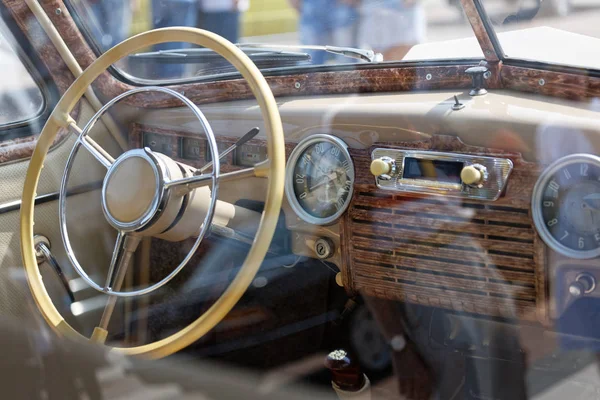 Old cabin, console and steering wheel in a vintage retro car