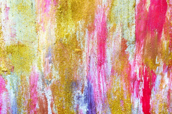 Abstract streams of paints on the wall. Modern textured arts. Paint stream. Bright colours bright yellow pink gold glitter golden shiny gouache oil watercolor. Dynamic color drops design. Paper board