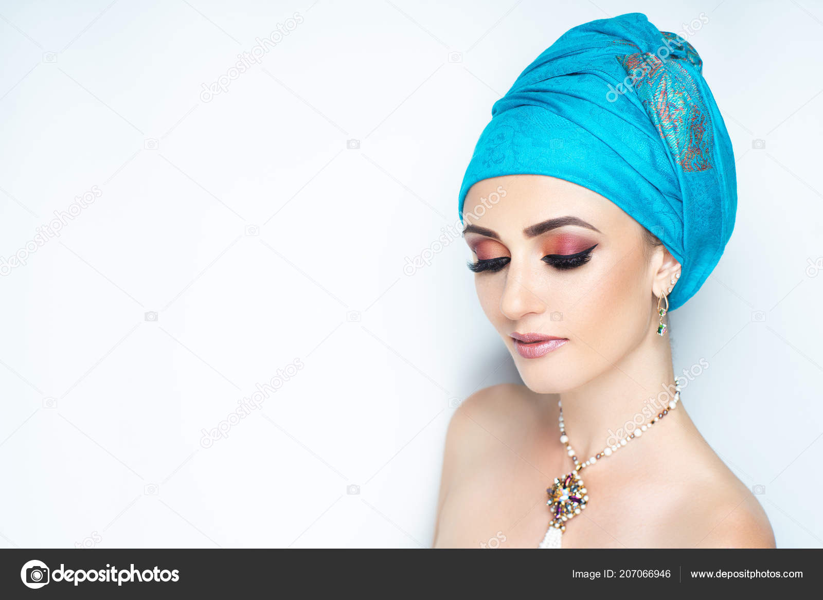 Young Beautiful Girl Wearing Blue Oriental Scarf Wrapped Her Head Stock Photo by ©OlgaOsa 207066946