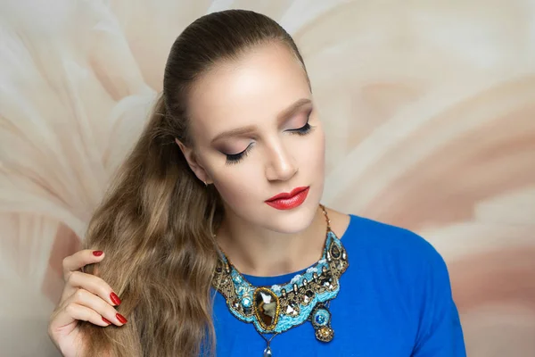 Young lady woman girl, bright make up, multicoloured shadows red lips lipstick lip gloss. Colorful massive necklace wow effect, jewellery made of beads, colourful conceptual idea. Horizontal banner