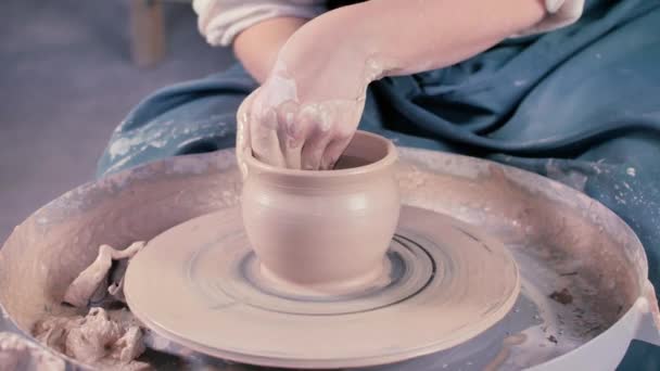 Potters hands shaping up the terracotta pot — Stock Video