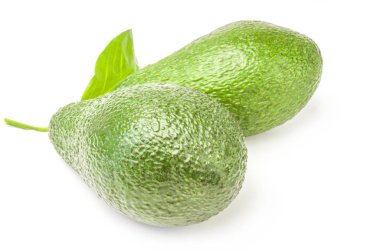 Fresh avocados isolated on white clipart