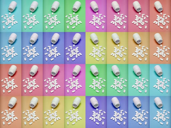 Medication bottle and white pills spilled on pastel coloured backgrounds. Medication and prescription pills flat lay background. Creative Opioid epidemic concept.