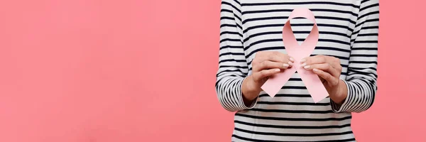 Midsection Young Woman Holding Pink Breast Cancer Awareness Ribbon Isolated — Stock Photo, Image