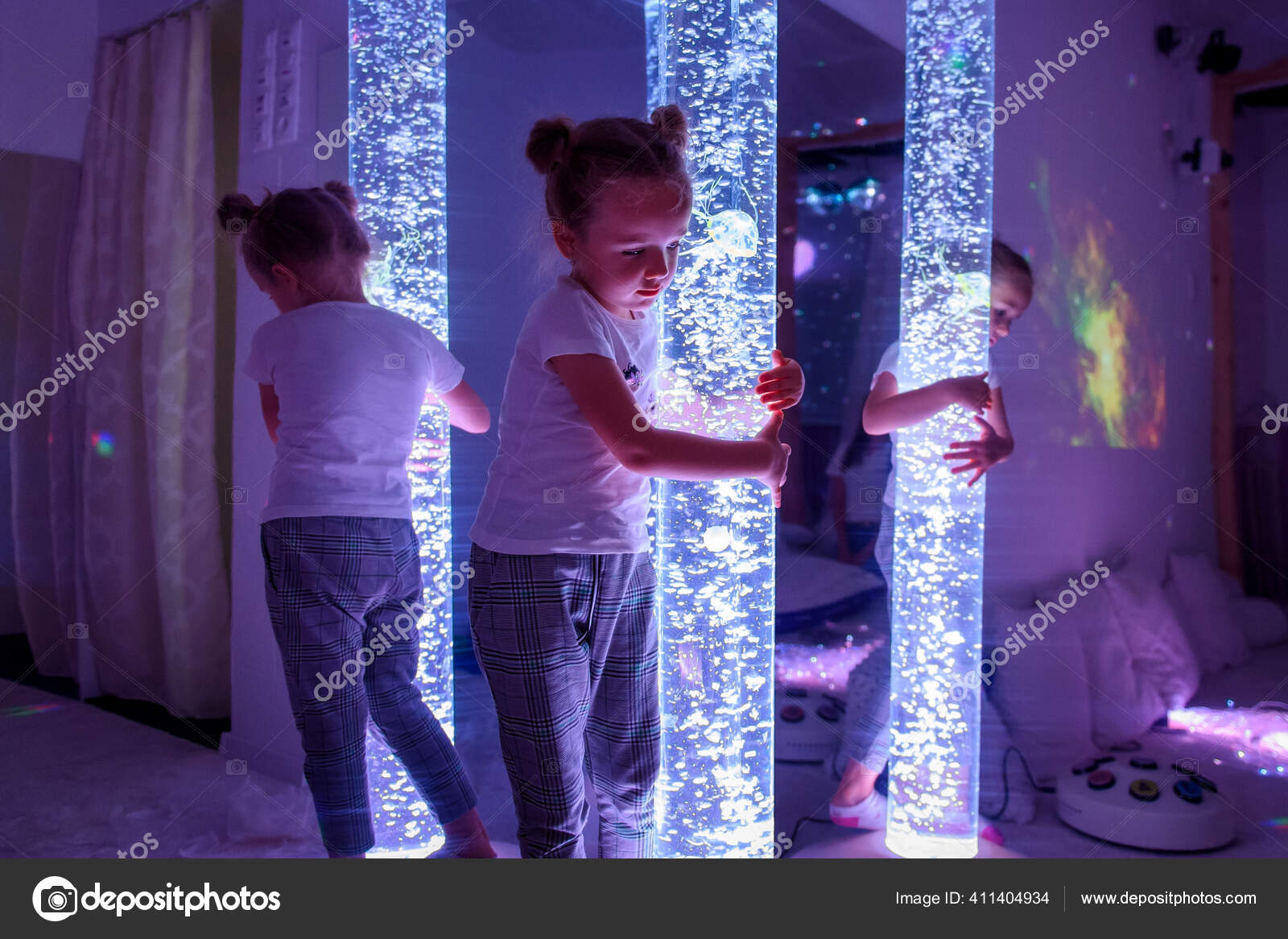 Child Therapy Sensory Stimulating Room Snoezelen Autistic Child Interacting  Colored Stock Photo by ©andreaobzerova 411404934