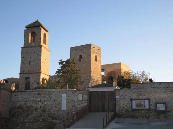 Three square tower buildings at arabic castle in Andalusian village