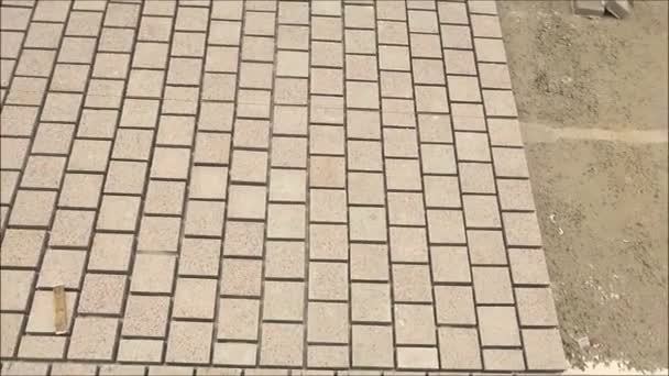 Square paving stones awaiting grouting in village street in Andalusia — Stock Footage Square Paving Stones Awaiting Grouting Village Street Andalusia Stock Video