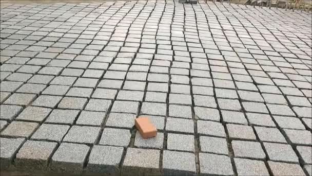 Square paving stones awaiting grouting in village street in Andalusia — Stock Footage Square Paving Stones Awaiting Grouting Village Street Andalusia Video Clip