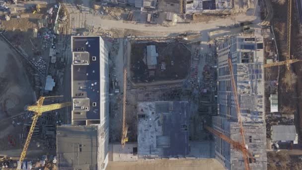 Construction site of a new residential complex. Flying over the construction site — Stock Video