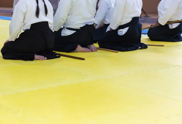 People in kimono on martial arts weapon training seminar — Stock Photo, Image