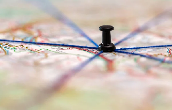 The black pin marks a location on a map with routes Royalty Free Stock Photos