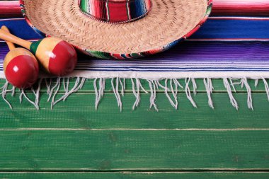 Mexico mexican sombrero maracas fiesta wood background  clipart