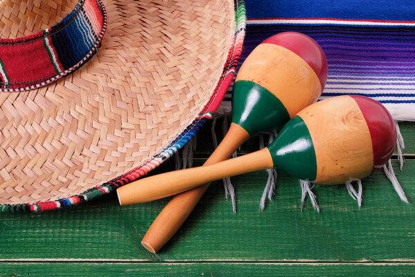 Mexico cinco de mayo festival mexican sombrero maracas close seup
