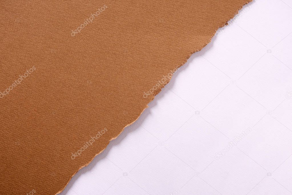 Torn brown paper diagonal strip background 