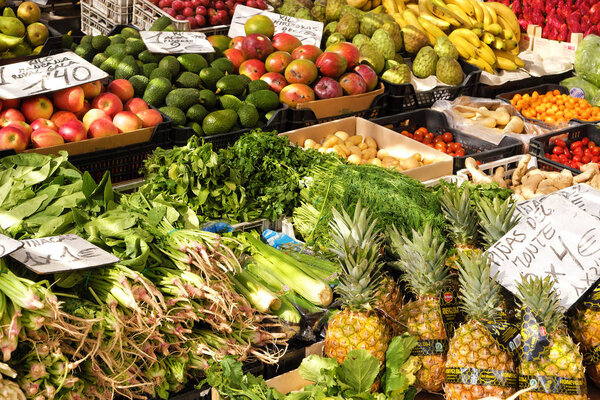 Marbella, Malaga province, Andalucia, Spain - March 18, 2019 :  fresh fruits and vegetables for sale in a local farmers market