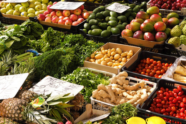 Marbella, Malaga province, Andalucia, Spain - March 18, 2019 :  fresh fruits and vegetables for sale in a local farmers market