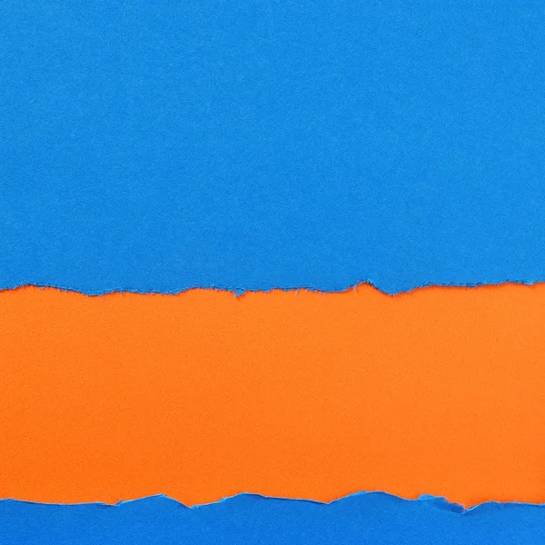 Torn blue paper strip orange background border frame — Stock Photo, Image