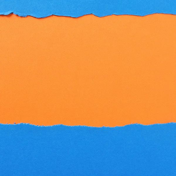 撕毁纸背景蓝色橙色带框架 — 图库照片