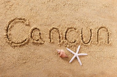 Cancun Meksika el yazısı plaj kum mesajı