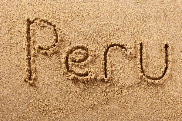 Perù spiaggia scritta a mano sabbia messaggio — Foto Stock
