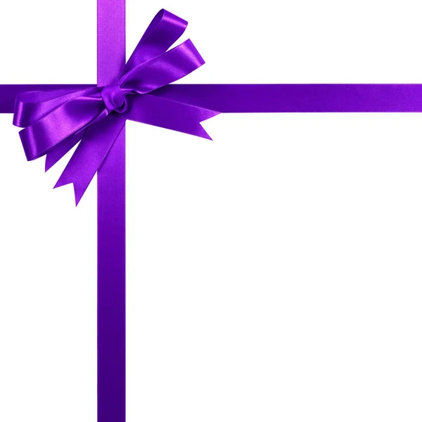 Purpurowy prezent wstążka łuk pionowy narożnik ramka obramowanie na białym tle — Zdjęcie stockowe