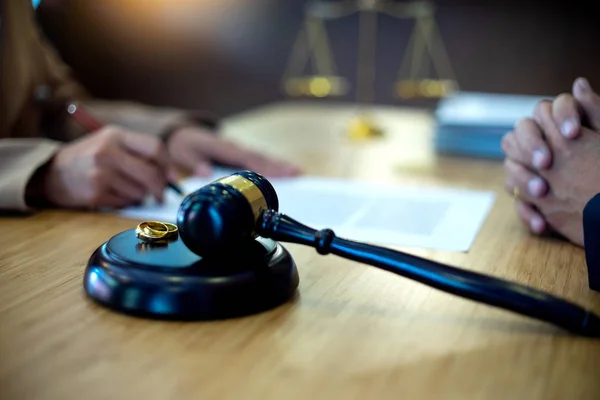 lawyer law with gavel balance work with marriage case show ring on the table