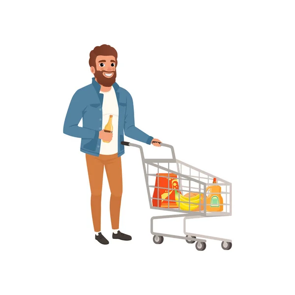 Hombre barbudo empujando carrito de compras con comestibles. Personaje de dibujos animados de un joven en el supermercado. Diseño de vector plano — Vector de stock