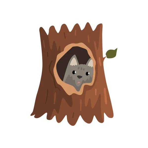 Cute wolf cub sitting in hollow of tree, hollowed out old tree and cute animal cartoon character inside vector Illustration on a white background
