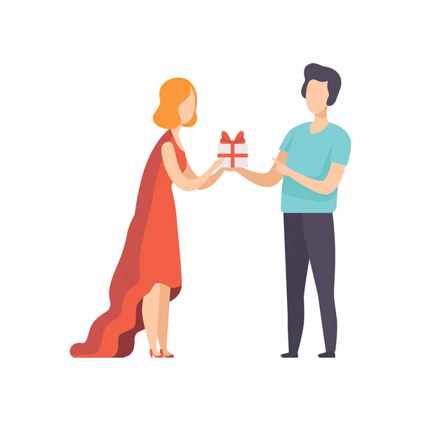 Молодий чоловік дарує подарункову коробку, прикрашену червоною стрічкою лук красивій жінці, люди святкують свято Векторні ілюстрації на білому тлі — стоковий вектор
