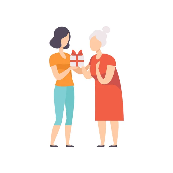 Vnučka dávat krabičky zdobené červenou stuhou lukem na její babička, lidé slaví svátek koncept vektorové ilustrace na bílém pozadí — Stockový vektor