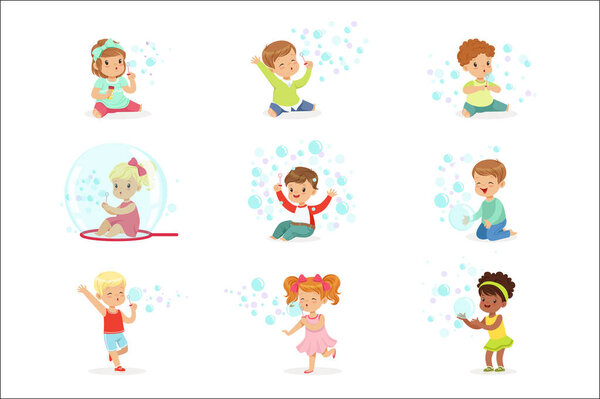 Children playing with colorful soap bubbles, holiday show of soap bubbles at a children party