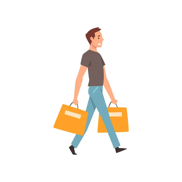 Junger Mann, der mit Einkaufstaschen, Einkäufen von Waren oder Geschenken unterwegs ist — Stockvektor