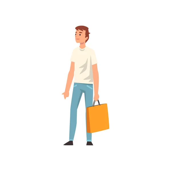 Młody mężczyzna stojący z torbą na zakupy, facet, zakup towarów lub prezenty ilustracja wektorowa — Wektor stockowy