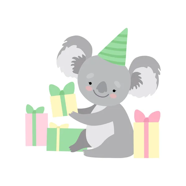 Симпатичный медведь Коала носить шляпу партии сидя с подарками коробки, смешной серый гуманизированный характер животных вектор иллюстрации — стоковый вектор