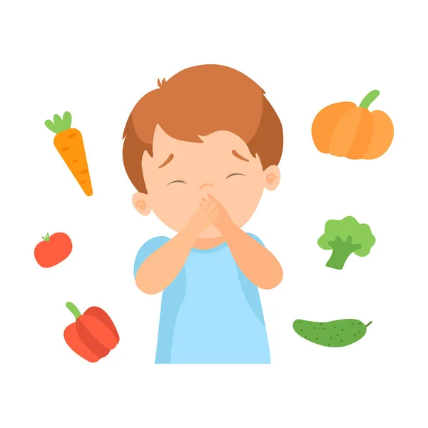 Leuke jongen weigert te eten van groenten, Kid Does niet zoals gezonde voeding vectorillustratie — Stockvector