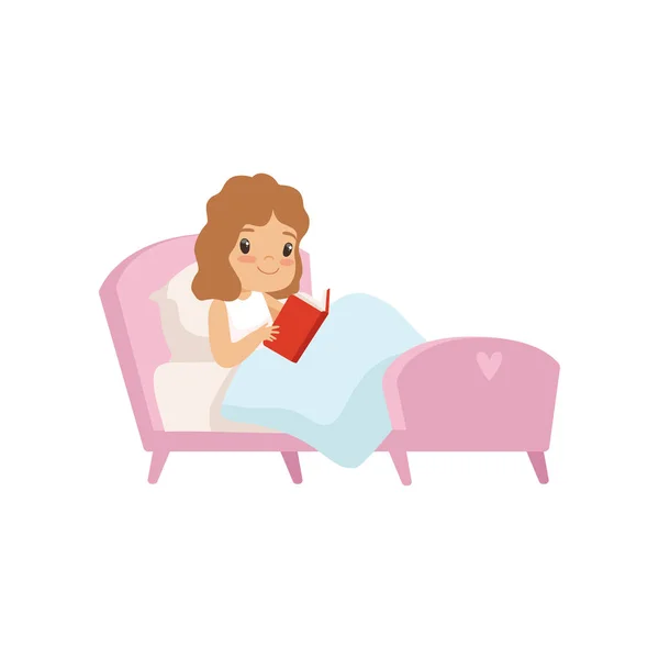 Симпатичная девочка, читающая книгу в постели — стоковый вектор