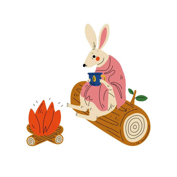 Кролик сидить біля багаття з чашкою чаю, тваринного характеру, що мають походи пригод подорожі або кемпінг подорож Векторна ілюстрація — стоковий вектор
