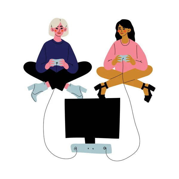 Two Young Women Sitting on Floor with Crossed Legs and Playing Video Games, Friends Spending Time Together Vector Illustration — Stock Vector