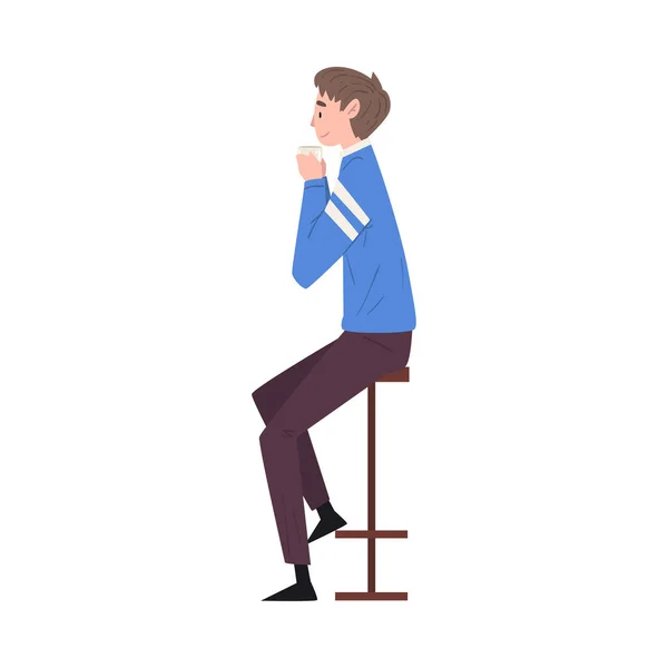 Young Man Sitting on Chair at Bar Drinking Coffee and Relaxing Vector Illustration — Stock Vector